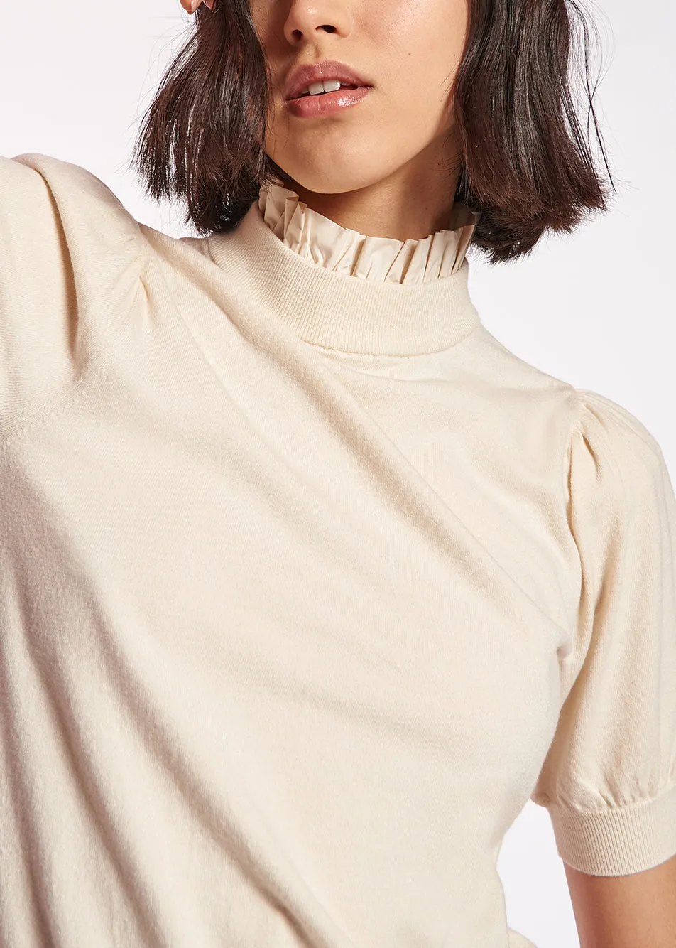 Off-white short-sleeved sweater with stand-up collar