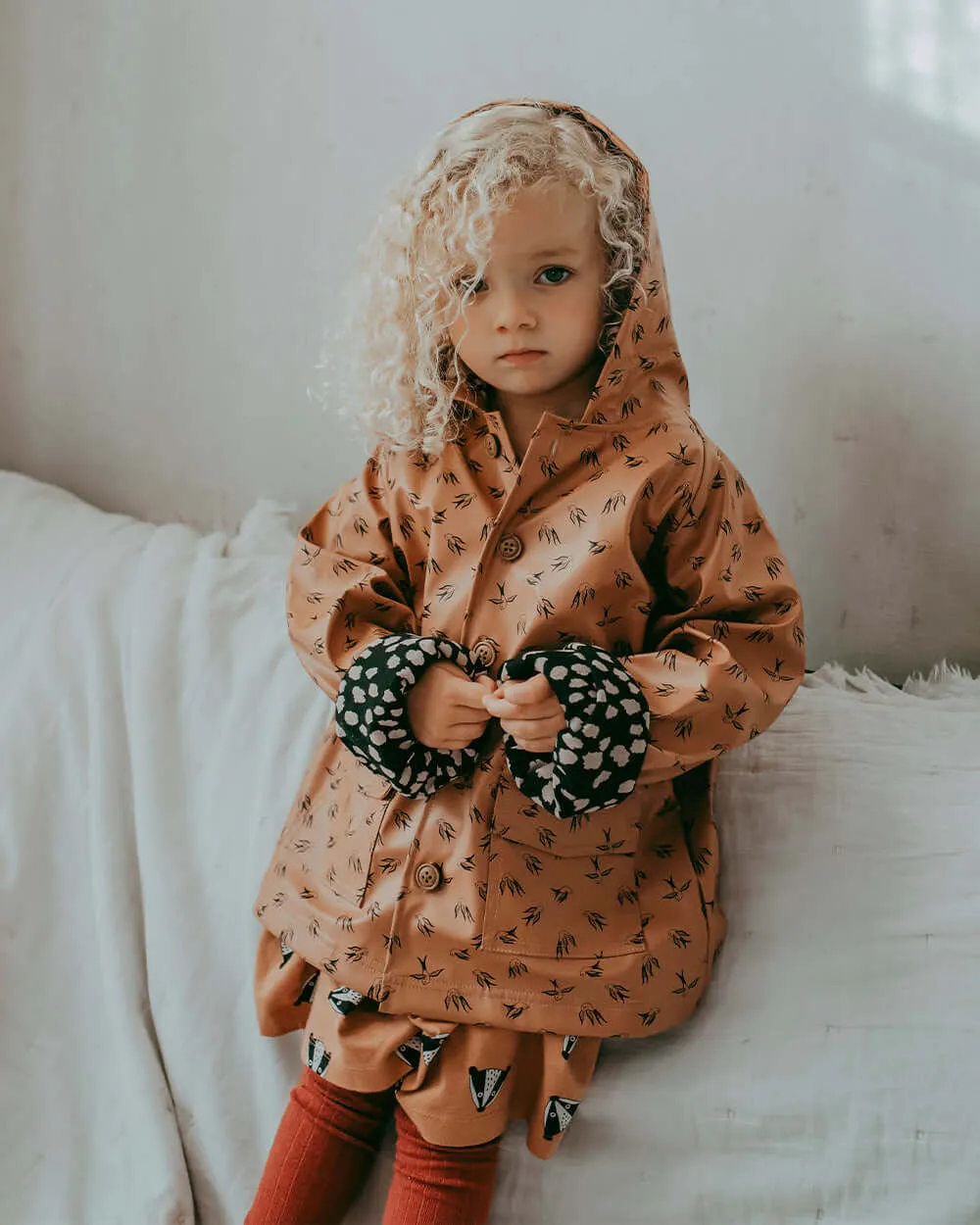 Orange Dancing Bird Print Hooded Raincoat