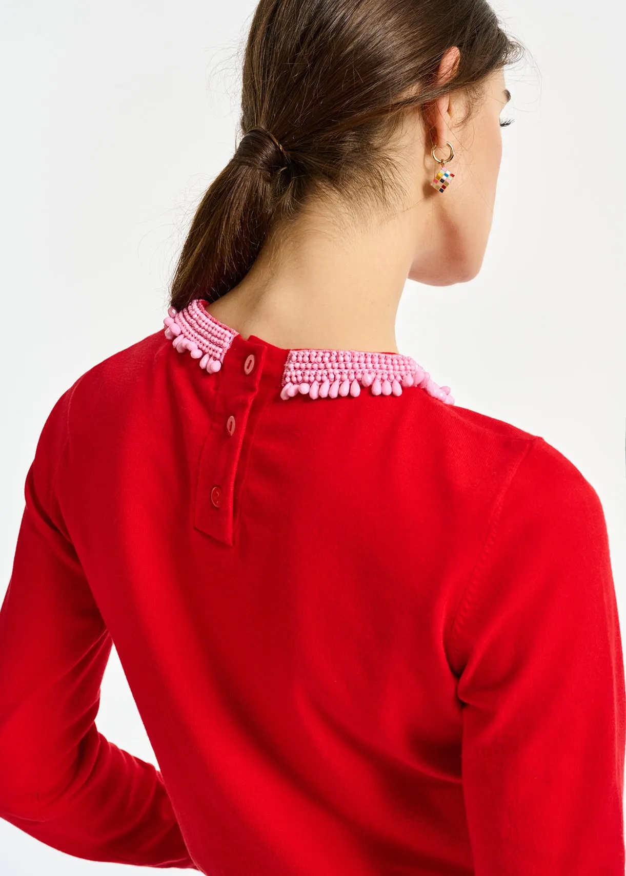 Red fine-knit sweater with bead-embroidered neckline