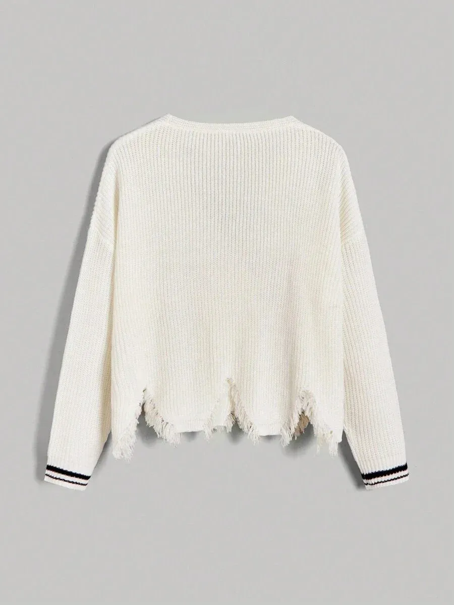 Tecla Ripped Hem Double Breasted Knit Cardigan in Beige
